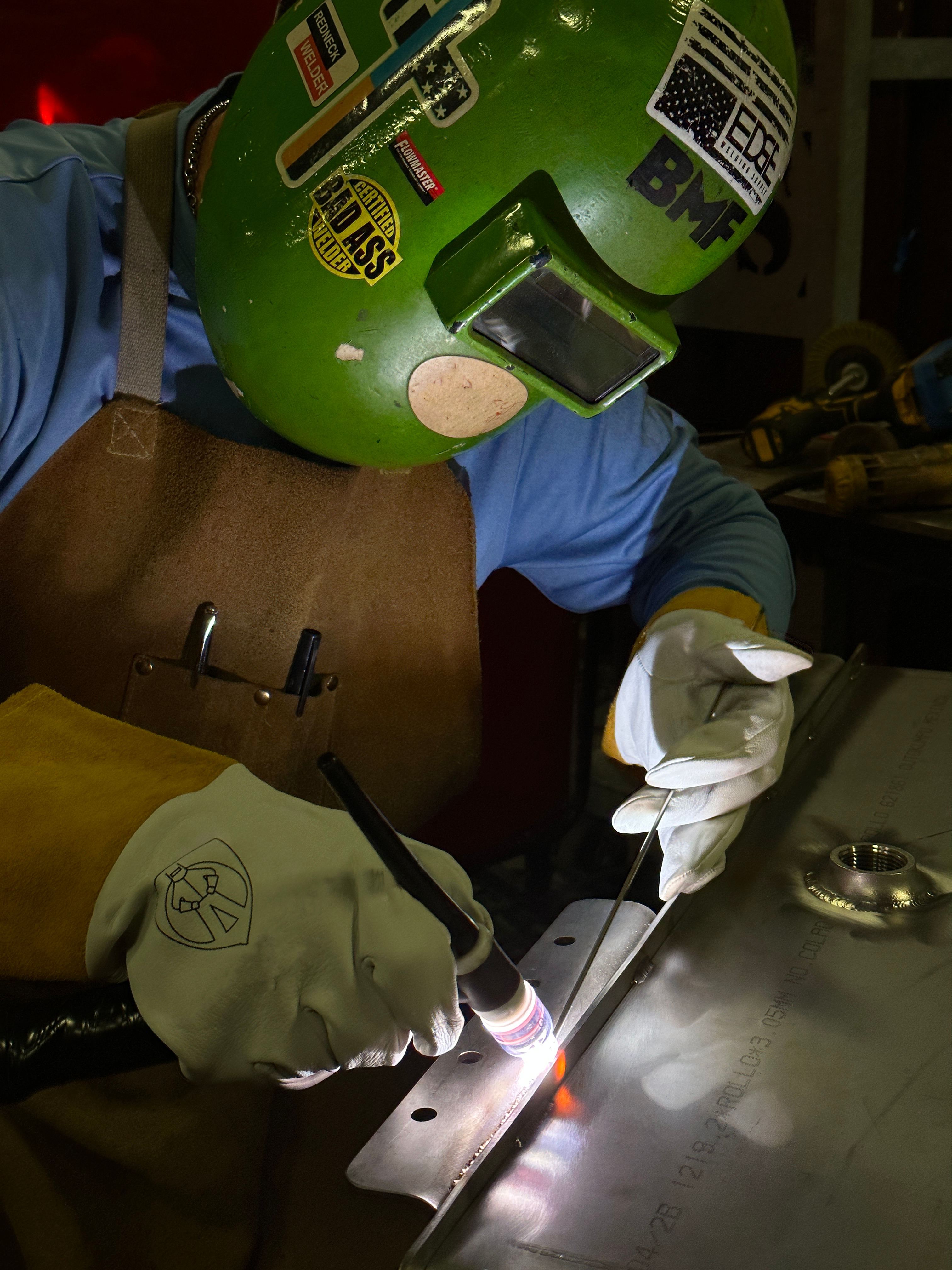 Person welding on stainless steel